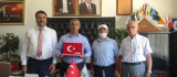 Başkan Gözükara'dan Osman Gönültaş'a Başarı Plaketi